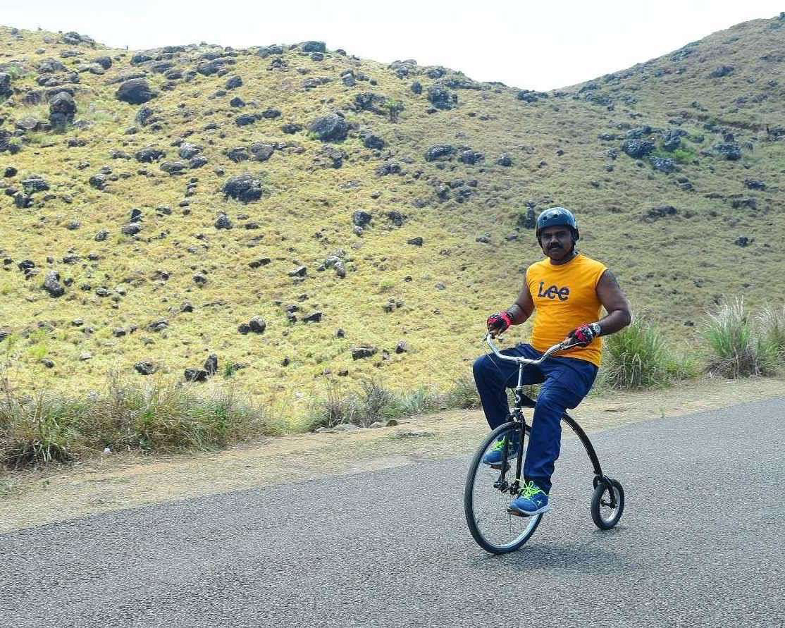 Meet the incredible penny farthing rider PK Kumar and his family